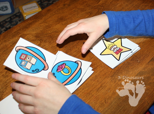 Free Easy to Play Rhyming Planet and Star Matching Game - 4 pages of printables rhyming game on rings - 3Dinosaurs.com