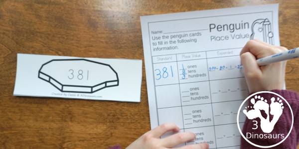 Free Penguin Place Value Matching - 2 levels of learning with place value up to hundreds for first grade and second grade learning with matching cards and recording sheets  - 3Dinosaurs.com