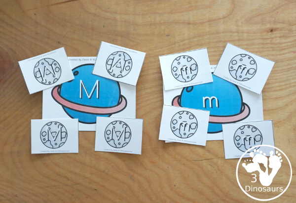 Free Space ABC Planet and Moon Matching Printable with matching uppercase and lowercase letters for kids with a planet with the letter and four moons for each planet. A great hands-on letter activity for kids - 3Dinosaurs.com