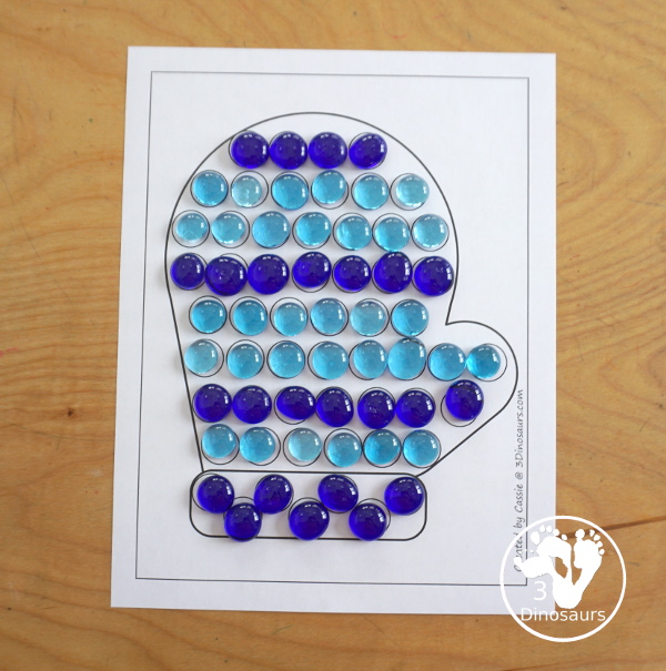 Free Mitten Fine Motor Mats - three mitten printables with mitten template printable, mitten tracing printables, and a mitten dot marker printable. All great for a winter fine motor center. - 3Dinosaurs.com