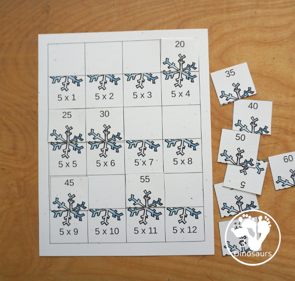 Winter Multiplication & Division Cut & Paste and Matching with cut and paste worksheets for division and multiplication with numbers 1 to 12 and match puzzles and matching mats for division and multiplication. It has a great winter snowflake theme for the printables - 3Dinosaurs.com