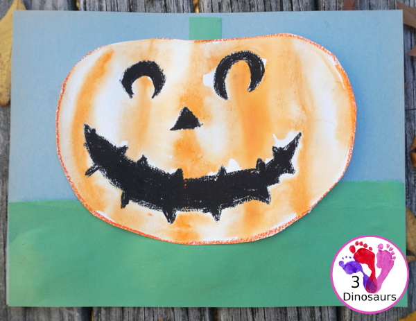 Watercolor Process Art Jack-O-Lantern - a fun Halloween painting activity to do with kids. It is great for kids that love to be creative and do things their own way - 3Dinosaurs.com 