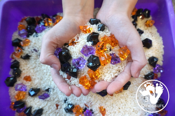 Halloween Black, Orange, and Purple Sensory Bin - a fun rice base sensory bin with colors black, orange and purple for the colors.- 3Dinosaurs.com