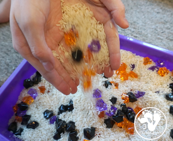 Halloween Black, Orange, and Purple Sensory Bin - a fun rice base sensory bin with colors black, orange and purple for the colors.- 3Dinosaurs.com