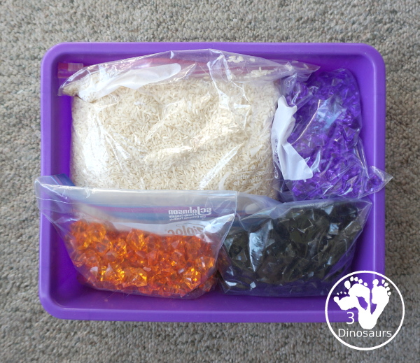 Halloween Black, Orange, and Purple Sensory Bin - a fun rice base sensory bin with colors black, orange and purple for the colors.- 3Dinosaurs.com