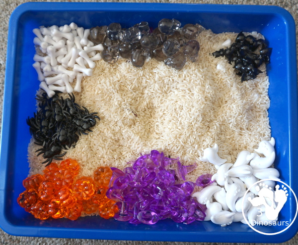 Halloween Sensory Bin - a simple and easy sensory bin for Halloween with different Halloween themes in the sensory bin - 3Dinosaurs.com