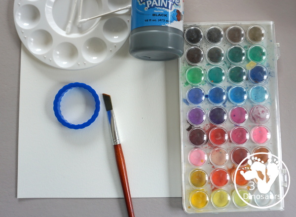 Watercolor Poppy Painting For Veteran's Day - a fun  watercolor painting using cookie cutters for the circle flowers and q-tip painting for the center. Simple and easy to do with kids. - 3Dinosaurs.com