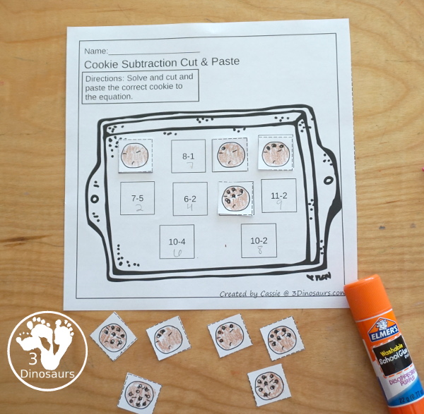 Free Cookie Subtraction Cut & Paste Worksheet - two fun worksheets that work on subtraction and matching cookies with chocolate chips for the answers. It is a fun change to subtraction worksheets for kids. - 3Dinosaurs.com