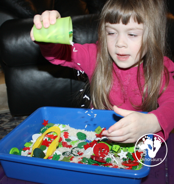 Christmas Button Sensory Bin is a simple and easy button sensory bin with a rice base that uses the colors red, green, and white. 3Dinosaurs.com