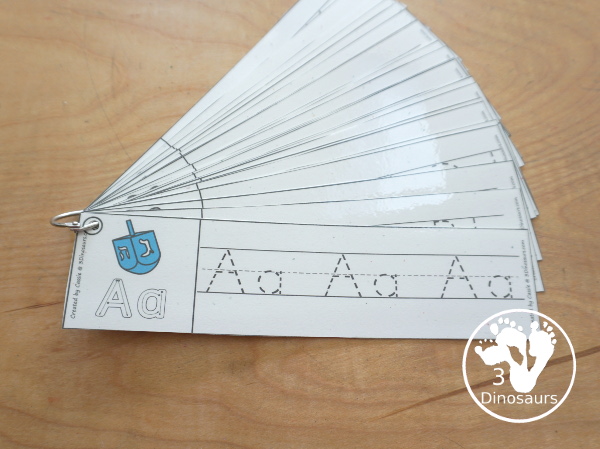 Free Hanukkah ABC Tracing Strip Printables - with uppercase and lowercase together. You have fun kids with Hanukkah items plus you can see an example of how to trace the letters - 3Dinosaurs.com