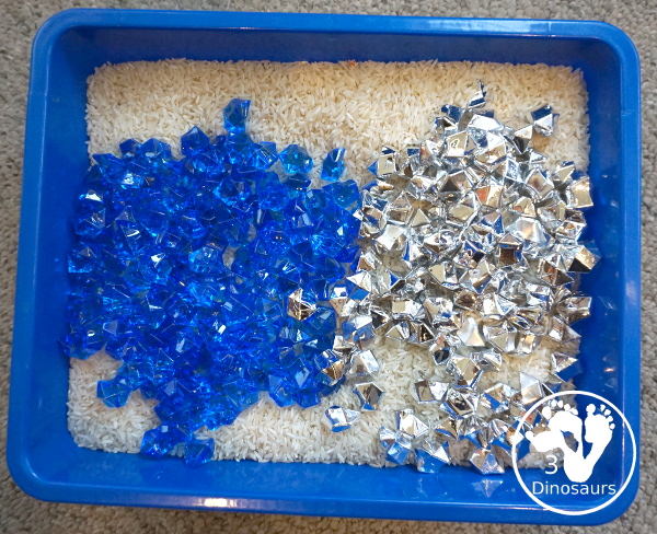 Hanukkah Blue & Silver Sensory Bin - a simple rice base sensory bin for Hanukkah with Blue and Silver that are Hanukkah colors. - 3Dinosaurs.com