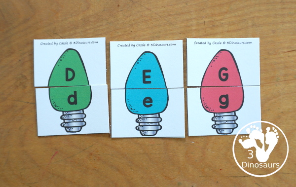 Free Christmas Lights ABC Matching Printable - a fun letter matching printable for kids with different colored Christmas lights. You match uppercase letters and lowercase letters- 3Dinosaurs.com