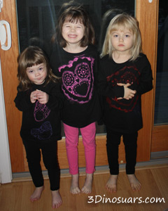 The girls wearing their shirts