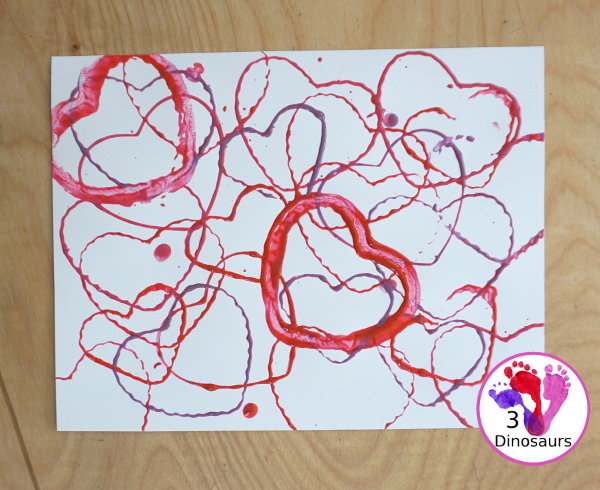 Heart Cookie Cutter Painting - a super easy craft for kids to do with cookie cutters and paint that you can do with tot, preschool and kindergarten - 3Dinosaurs.com