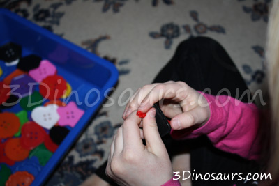 large buttons with pipe cleaners