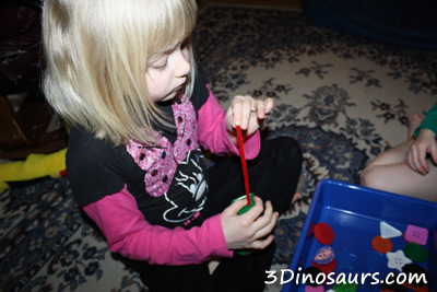 large buttons with pipe cleaners