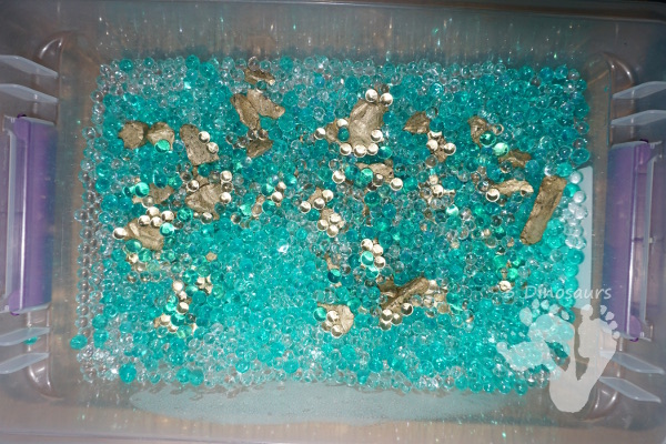 Easy To Make St Patricks Day Water Bead Sensory Bin - loads of search and find the gold fun in this sensory bin! - 3Dinosaurs.com