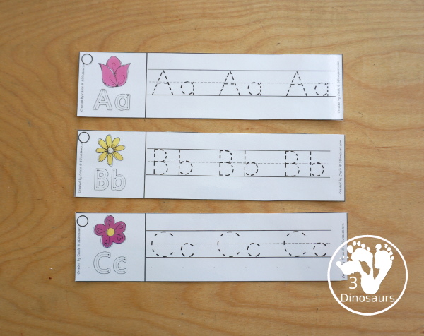 Free Flower Theme ABC Tracing Strips - with uppercase and lowercase together. You have flowers plus you can see an example of how to trace the letters - 3Dinosaurs.com