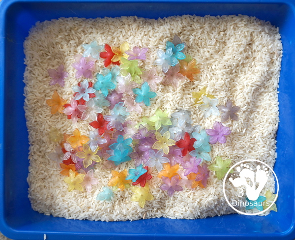 Flower & Rice Sensory Bin - a simple rice and acrylic flower sensory bin that works great for spring - 3Dinosaurs.com