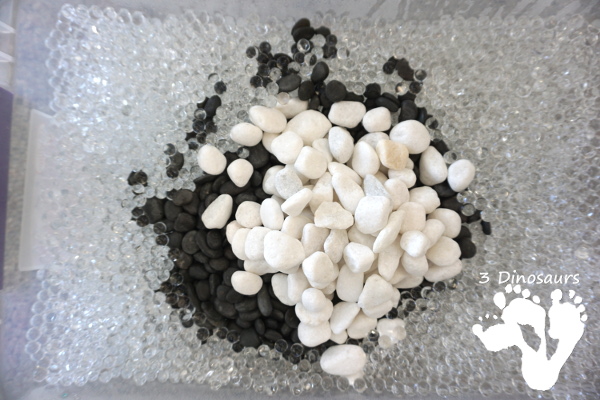 Black and White Space Themed Water Bead Sensory Bin - easy to make sensory bin for kids to play in  - 3Dinosaurs.com 