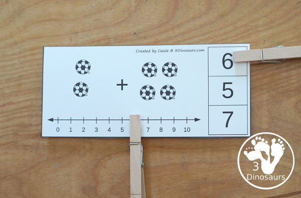 Free Soccer Addition Clip Card Printables: Addition 1 to 10 - with addition done with soccer balls and clip the answers on the side with a number line below to help with the addition. - 3Dinosaurs.com