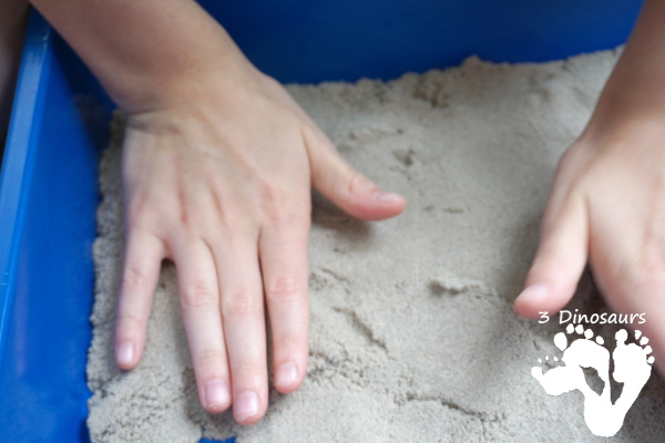 Kinetic Sand Space Moon Walking Sensory Bin - an easy way to explore the moon landing and have sensory fun - 3Dinosaurs.com