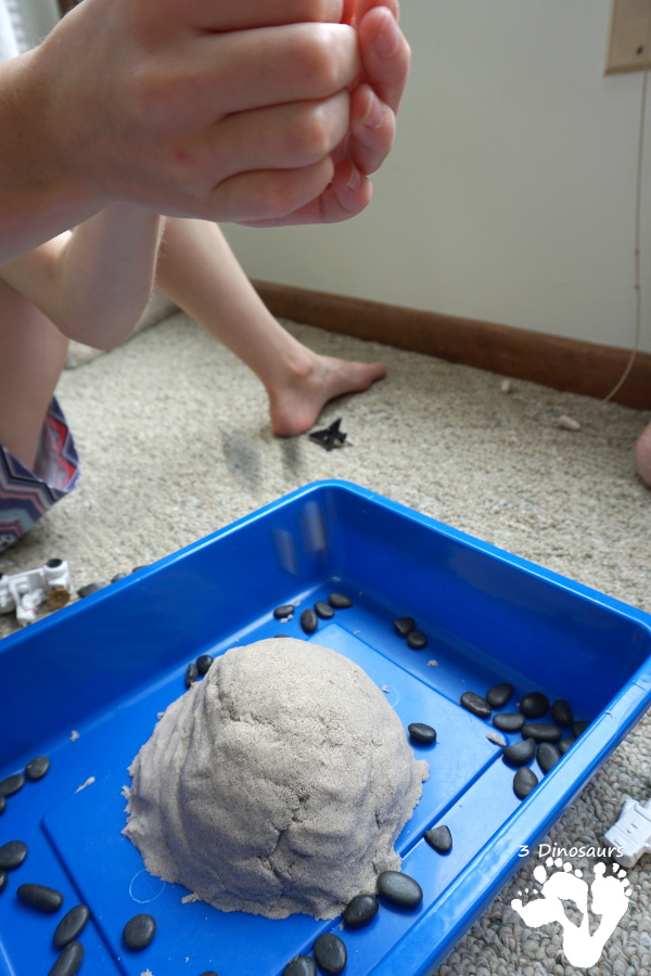 Kinetic Sand Space Moon Walking Sensory Bin - an easy way to explore the moon landing and have sensory fun - 3Dinosaurs.com