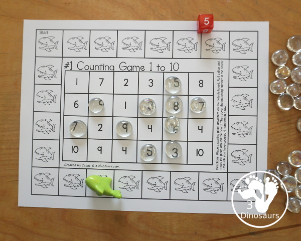 Free Shark Number Counting Game Printables - you have two number games that work on numbers from 1 to 10. You have a shark number word game and a shark numerical number game. Both fun ways to work on counting and numbers with a fun shark theme. - 3Dinosaurs.com