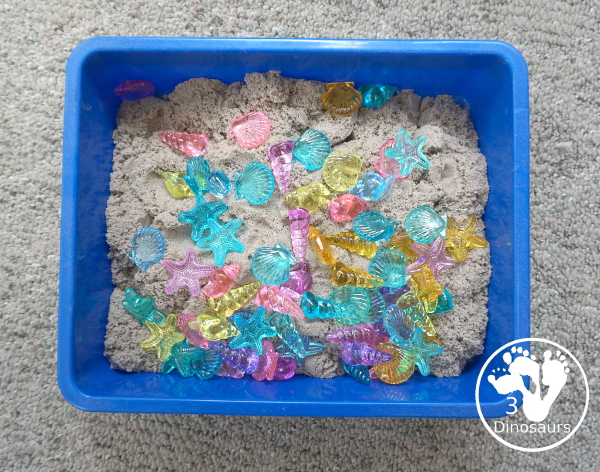 Beach Kinetic Sand & Shell Sensory Bin - for an easy to set up sensory play that kids can do any time of the year and work great for a beach theme day - 3Dinosaurs.com
