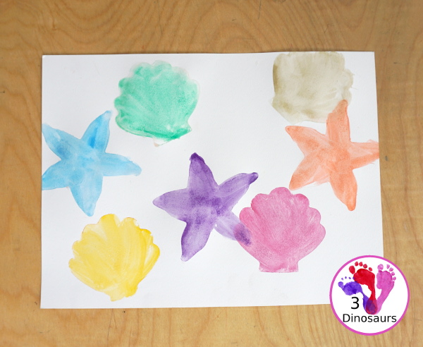 Shell Cookie Cutter Watercolor Painting for a fun beach painting theme for kids. With cookie cutters to make a fun and creative painting of shells - 3Dinosaurs.com