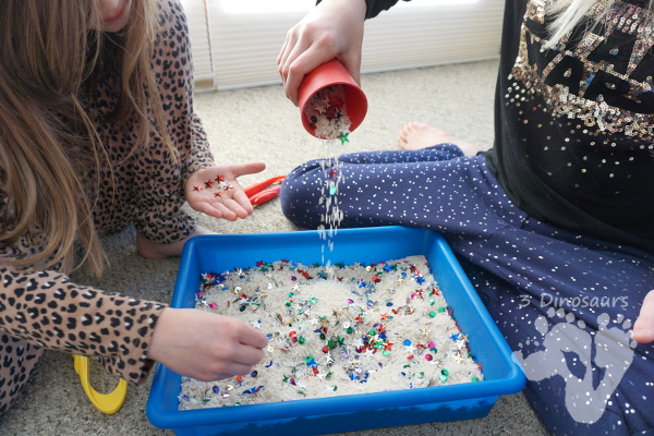 Sequin Theme Sensory Bin - a fun and easy sensory bin to set up for kids - 3Dinosaurs.com #sensorybin #sensoryskeeing #finemotorskills