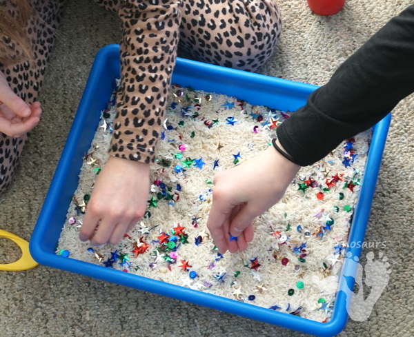 Sequin Theme Sensory Bin - a fun and easy sensory bin to set up for kids - 3Dinosaurs.com #sensorybin #sensoryskeeing #finemotorskills