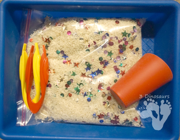 Sequin Theme Sensory Bin - a fun and easy sensory bin to set up for kids - 3Dinosaurs.com #sensorybin #sensoryskeeing #finemotorskills