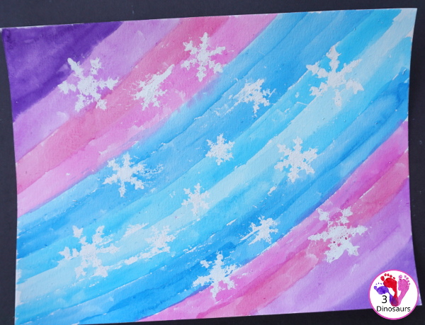 Watercolor & Oil Pastel Snowflakes Painting - easy snowflake painting activity that many different ages can do together - 3Dinosaurs.com