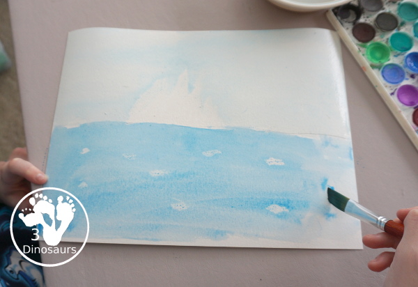 Iceberg Watercolor Painting with Tonight on the Titanic - a simple watercolor painting of an iceberg to go with the Magic Tree House Book Tonight on the Titanic. - 3Dinosaurs.com