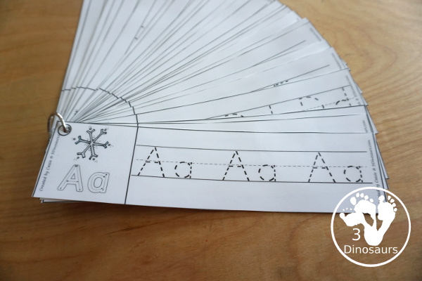 Free Snowflake Theme ABC Tracing Strips - with uppercase and lowercase together. You have fun kids with a snowflake plus you can see an example of how to trace the letters - 3Dinosaurs.com