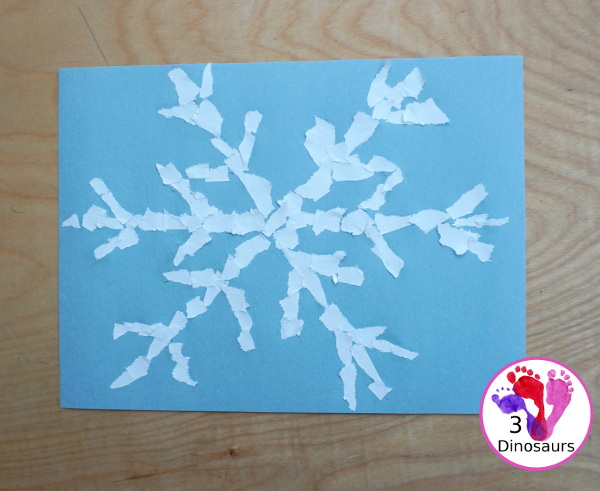 Torn Paper Snowflakes - a fun torn paper winter craft that kids can do and have a blast making - 3Dinosaurs.com