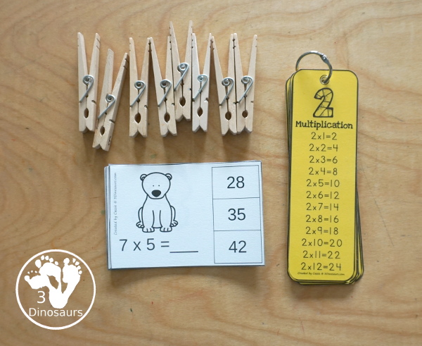 Free Arctic Animals  Multiplication Clip Cards - with multiplication from 1 to 12 for kids to work on clipping the correct answer for the multiplication with 4 cards for each number with 12 pages of printables - 3Dinosaurs.com