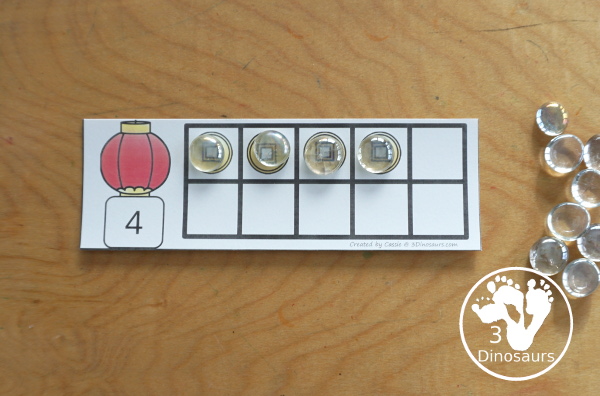 Free Chinese New Year Ten Frames with two sets of ten frames to work on counting from 1 to 10 with filled in ten frames to match the numbers and blank ten frames. A Great Lunar New Year Printable - 3Dinosaurs.com