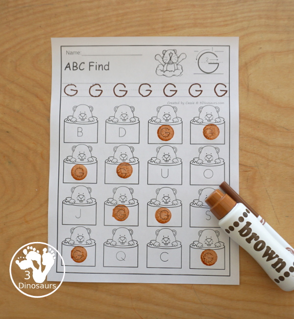 Groundhog ABC Letter Find Printable - with all 26 letters of the alphabet by tracing the letters and finding the letters with the groundhog. Works great for a Groundhog Day alphabet printable - 3Dinosaurs.com