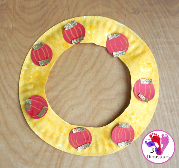 Lunar New Year Wreath Craft for kids - a simple paper plate wreath you can make with kids for the lunar new year and Chinese New year with a red lantern theme  - 3Dinosaurs.com