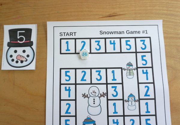 Snowman Number Sense Game from 1 to 20 with matching several different number types to the numerical number including tally marks, dominos, number word, ten frames, and tens and ones to build a snowman and fun game boards and worksheets to use with the games - 3Dinosaurs.com