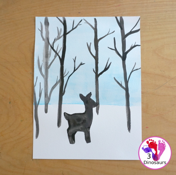 Deer In Winter Painting - a fun winter painting project with a deer walking though trees in winter. You have a watercolor painting for the background and a cookie cutter for the deer. - 3Dinosaurs.com