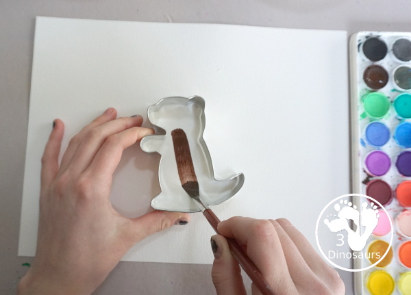 Groundhog Watercolor Painting with A Cookie Cutter - a fun way to see shadows of the groundhog and a fun fine painting activity for kids.- 3Dinosaurs.com