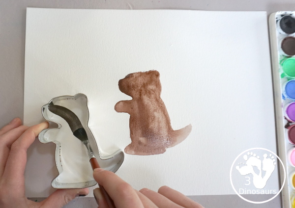 Groundhog Watercolor Painting with A Cookie Cutter - a fun way to see shadows of the groundhog and a fun fine painting activity for kids.- 3Dinosaurs.com