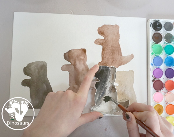 Groundhog Watercolor Painting with A Cookie Cutter - a fun way to see shadows of the groundhog and a fun fine painting activity for kids.- 3Dinosaurs.com