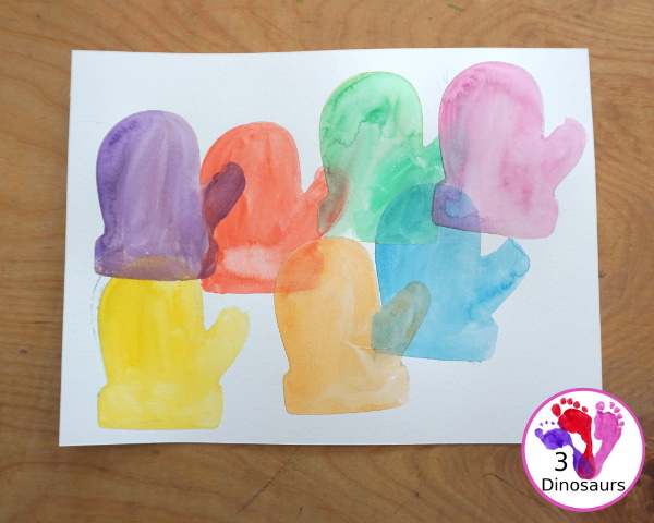 Mitten Watercolor Painting With Cookie Cutters - A simple painting you can do with kids of different ages by painting inside a cookie cutter to make a fun mitten painting - 3Dinosaurs.com