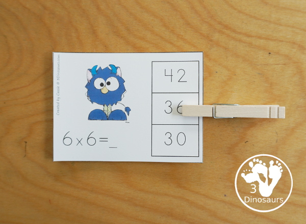 Free Monster Multiplication Clip Cards - with multiplication from 1 to 12 for kids to work on clipping the correct answer for the multiplication with 4 cards for each number with 12 pages of printables - 3Dinosaurs.com