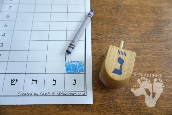 Free Hanukkah Spin & Count Dreidel - 2 graphs and one tally sheet to work on math with a dreidel - 3Dinosaurs.com