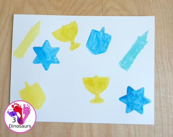 Hanukkah Watercolor Cookie Cutter Painting - a simple watercolor painting for Hanukkah using Hanukkah themed cookie cutters - 3Dinosaurs.com